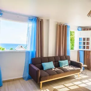https://petit-houezel-joli-appartement-neuf-et-cosy-avec-vue-mer.comcaribbean.com